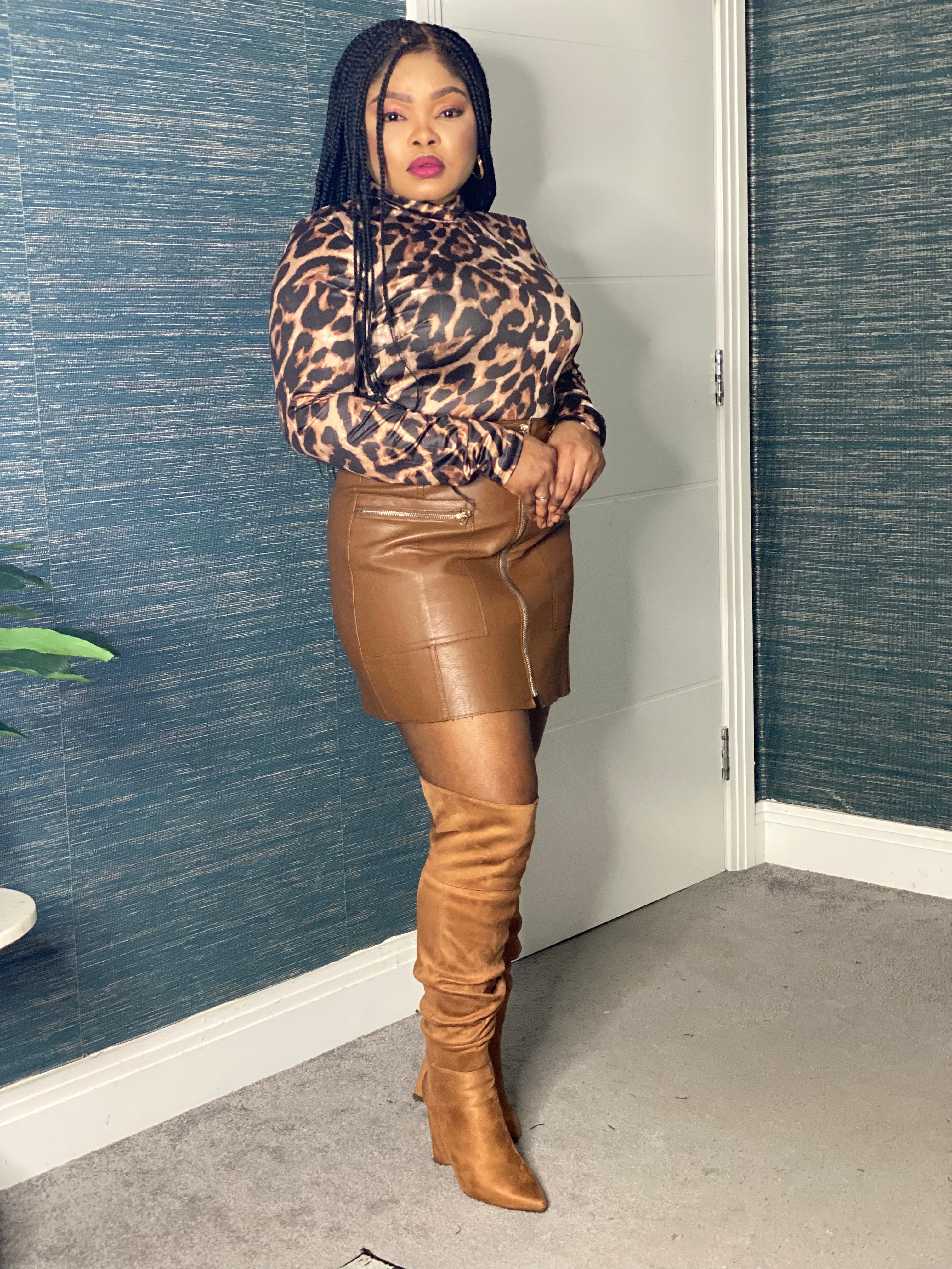 Long leather skirt sales knee high boots